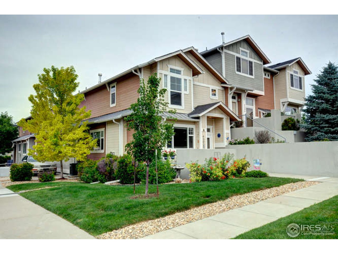 4202 Riley Drive Longmont, CO 80503 - Photo 2 of 25 East and south side of Townhome