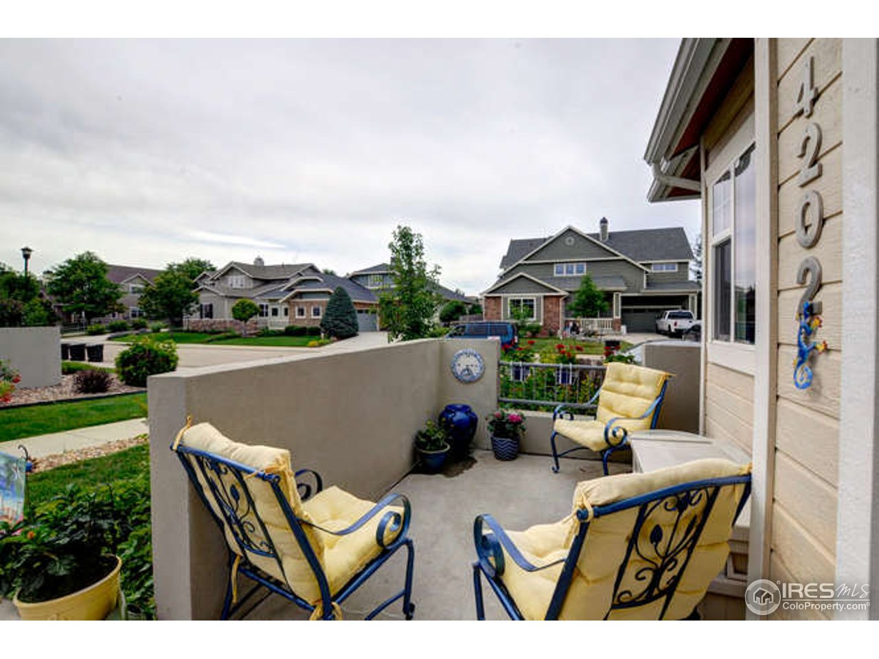 4202 Riley Drive Longmont, CO 80503 - Photo 23 of 25 east and south facing patio