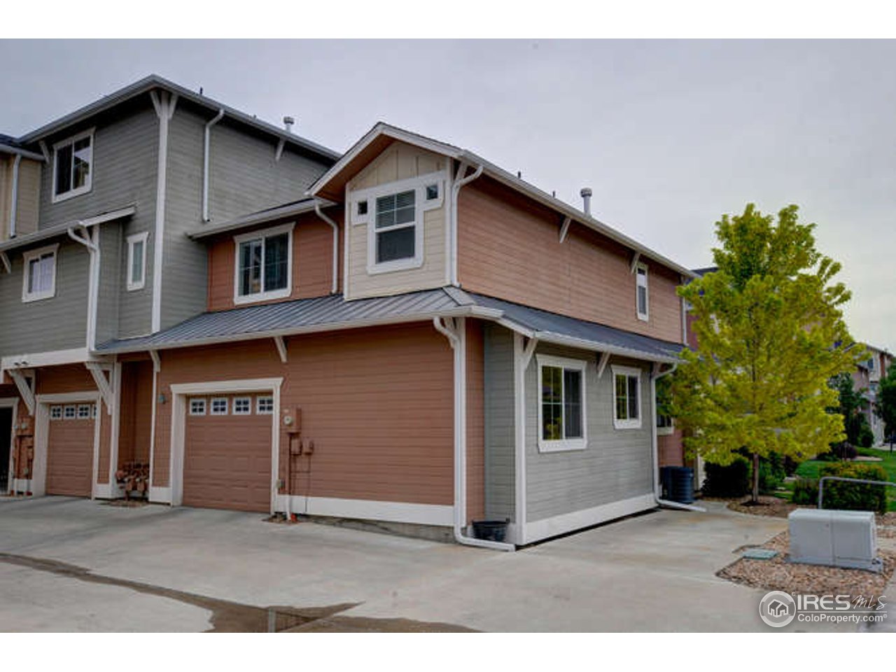 4202 Riley Drive Longmont, CO 80503 - Photo 24 of 25 garage and outdoor parking space