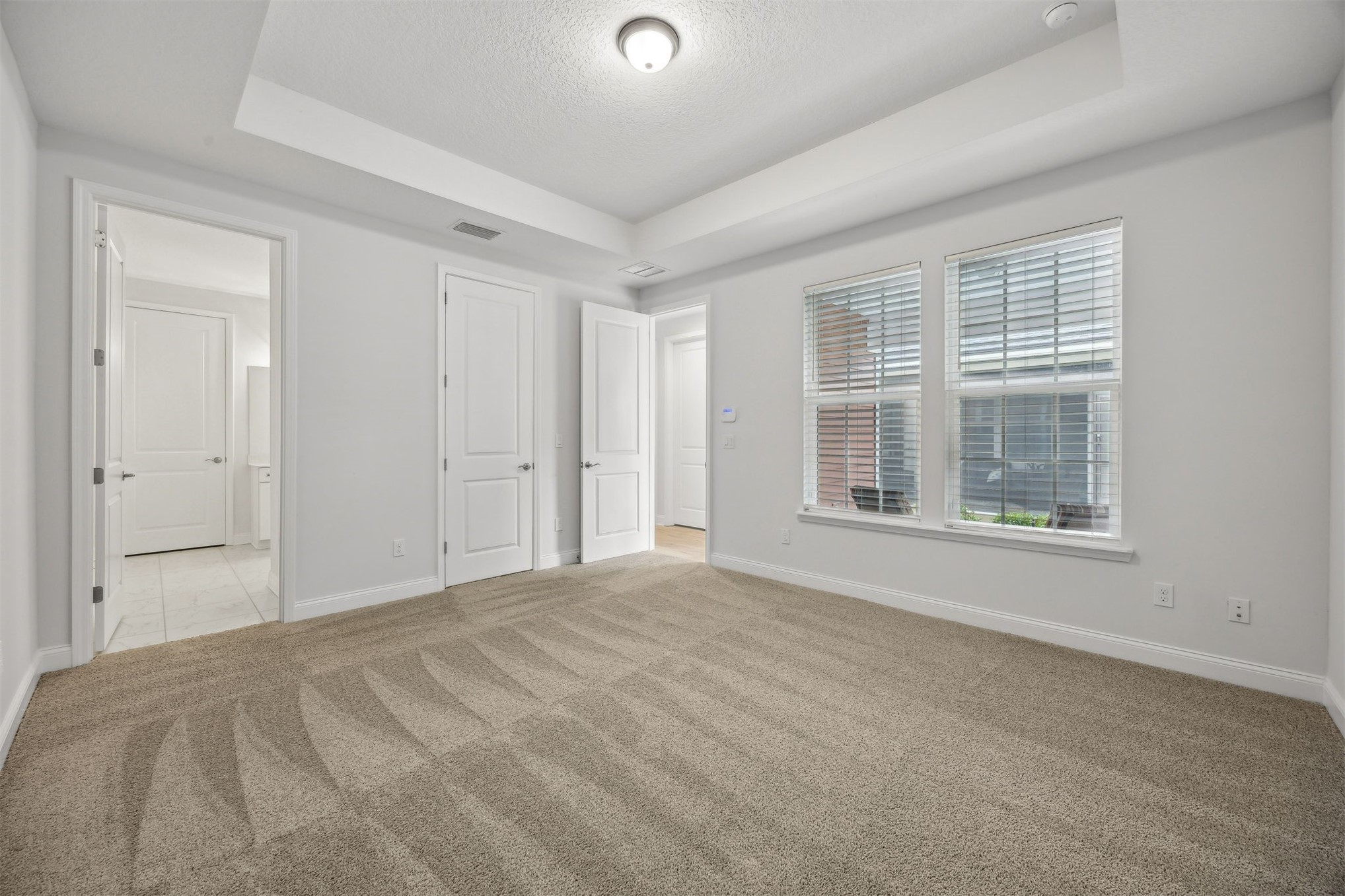 230 Wildlight Avenue Yulee, FL 32097 - Photo 17 of 73 a view of an empty room with a window