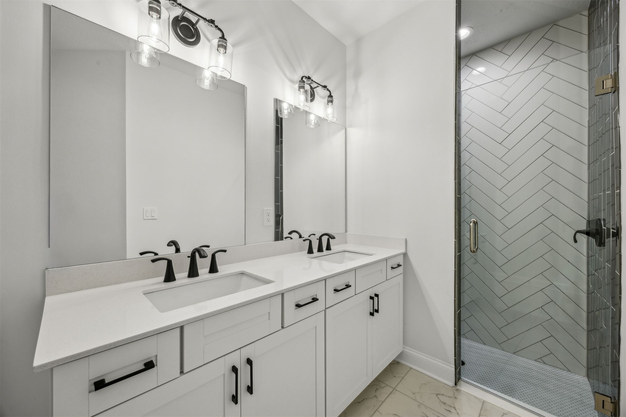 230 Wildlight Avenue Yulee, FL 32097 - Photo 20 of 73 a bathroom with a double vanity sink mirror and shower