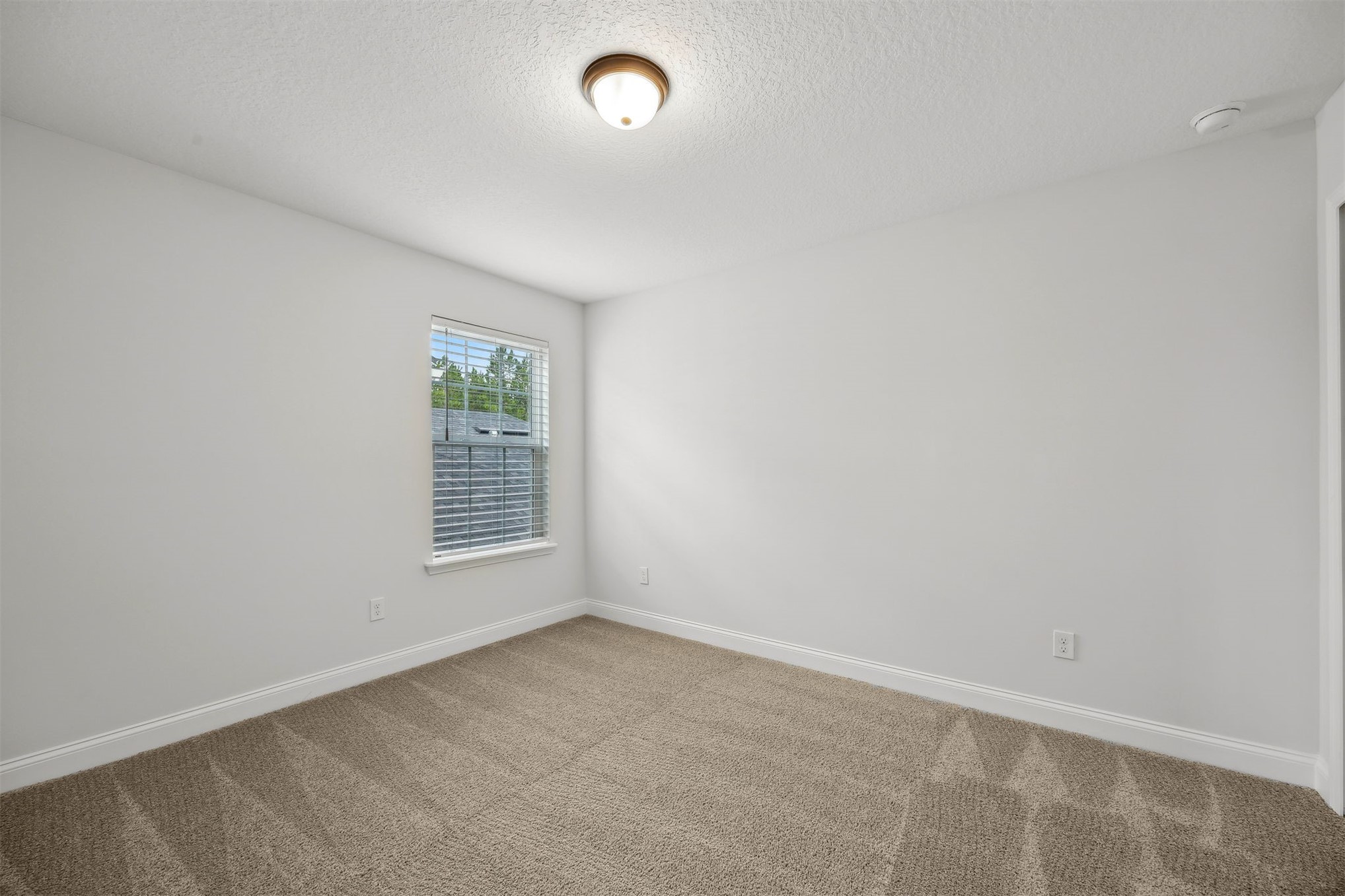230 Wildlight Avenue Yulee, FL 32097 - Photo 25 of 73 an empty room with a window