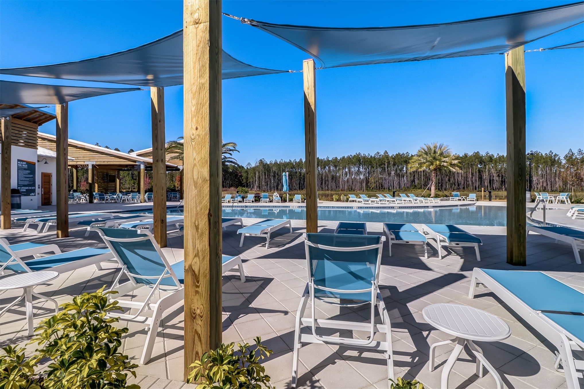 230 Wildlight Avenue Yulee, FL 32097 - Photo 52 of 73 a view of a patio with chairs and a table