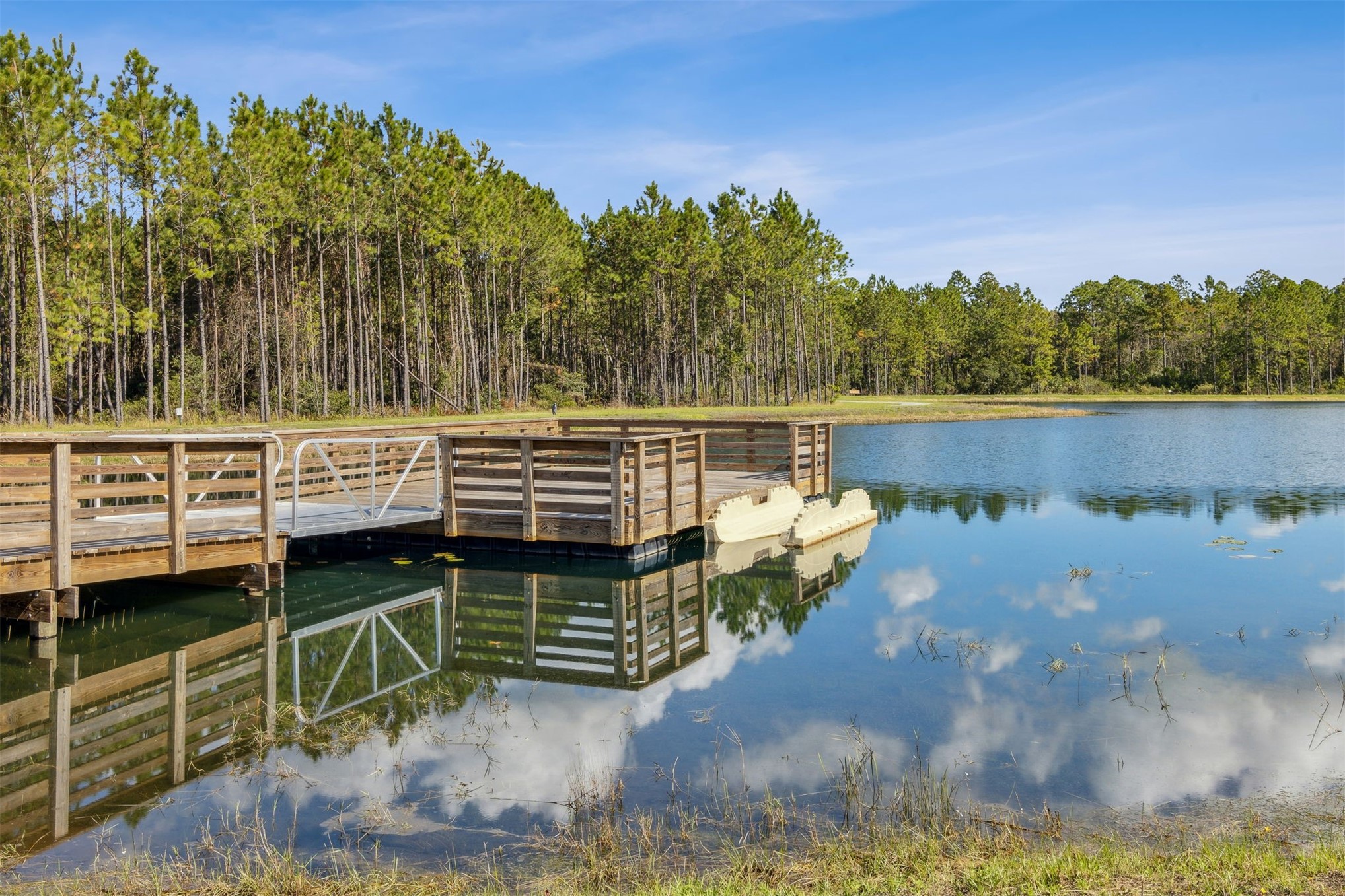 230 Wildlight Avenue Yulee, FL 32097 - Photo 68 of 73 a view of a deck with sunset