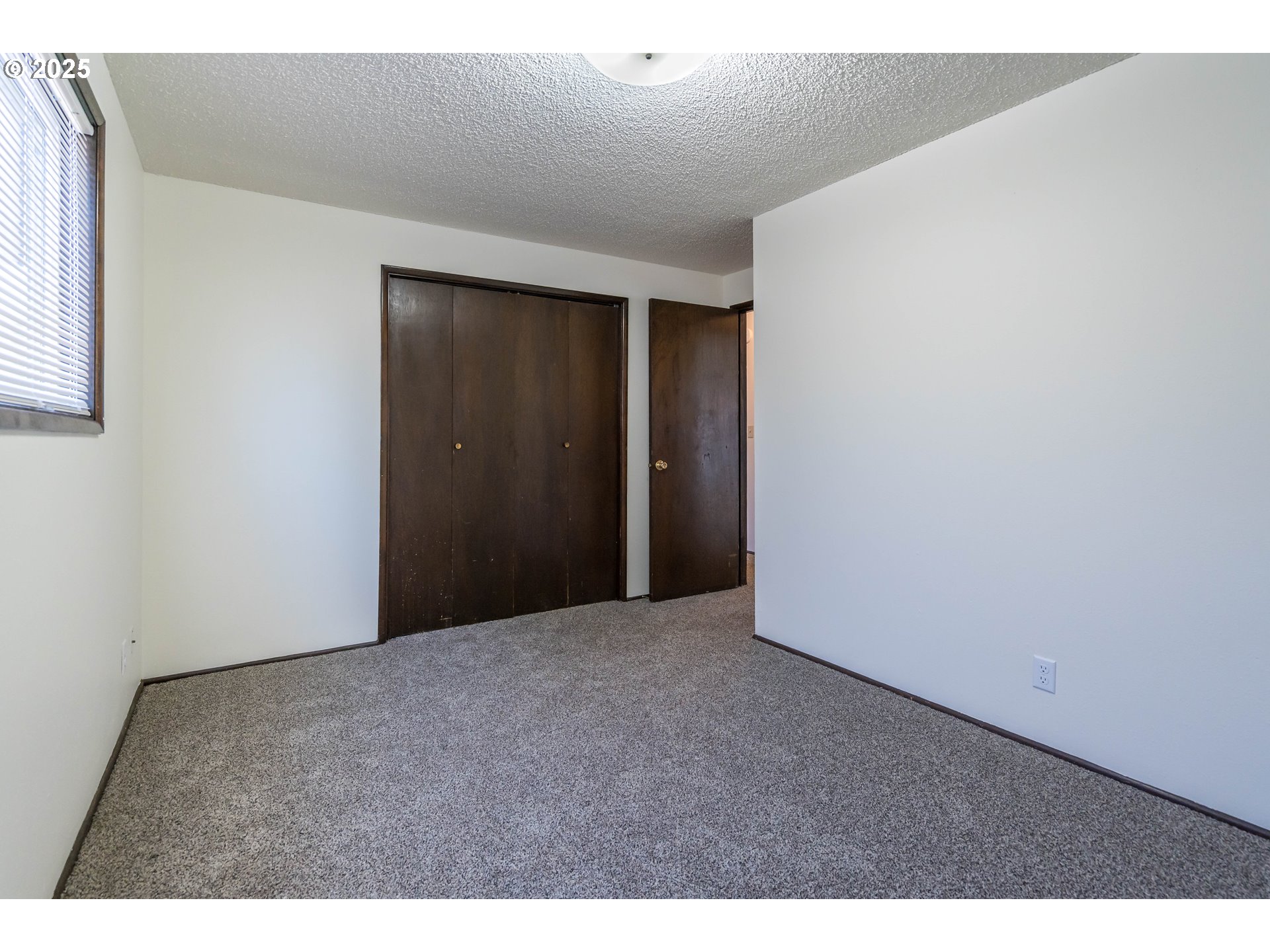 231 South 40th Street Springfield, OR 97478 - Photo 12 of 19 a view of an empty room