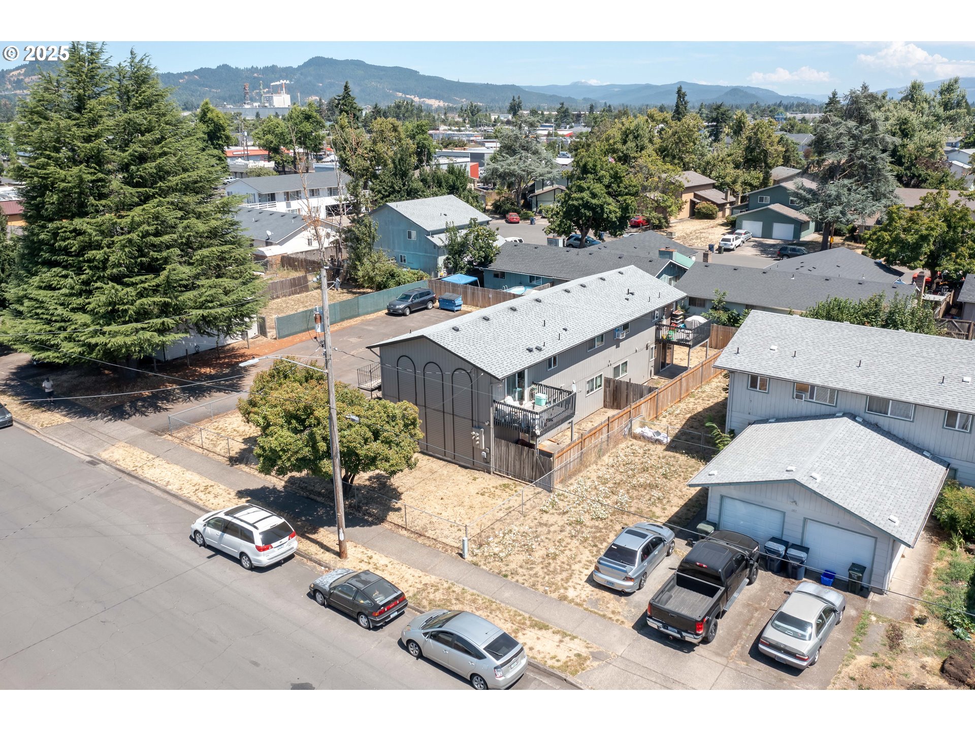 231 South 40th Street Springfield, OR 97478 - Photo 17 of 19 an aerial view of residential houses with outdoor space