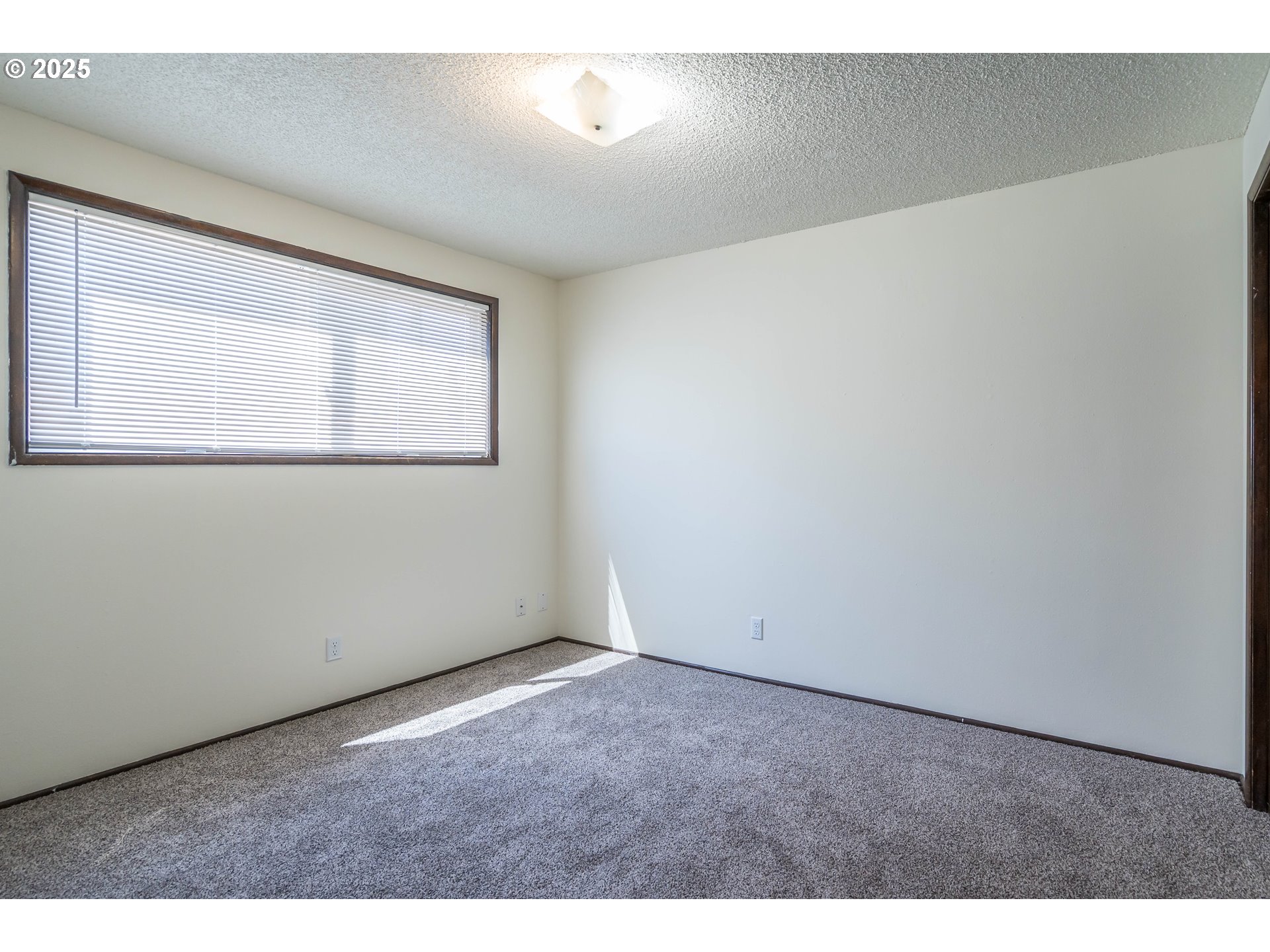 231 South 40th Street Springfield, OR 97478 - Photo 10 of 19 a view of an empty room with a window
