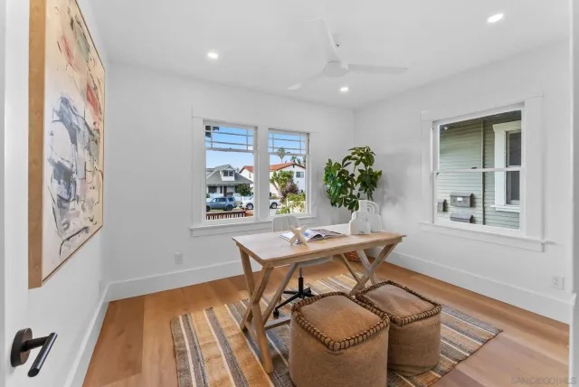 a workspace with furniture and window