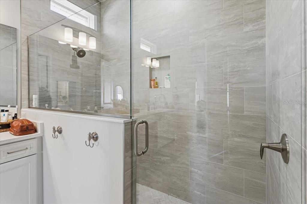 12030 Southwest 32nd Lane Gainesville, FL 32608 - Photo 23 of 57 a bathroom with a shower