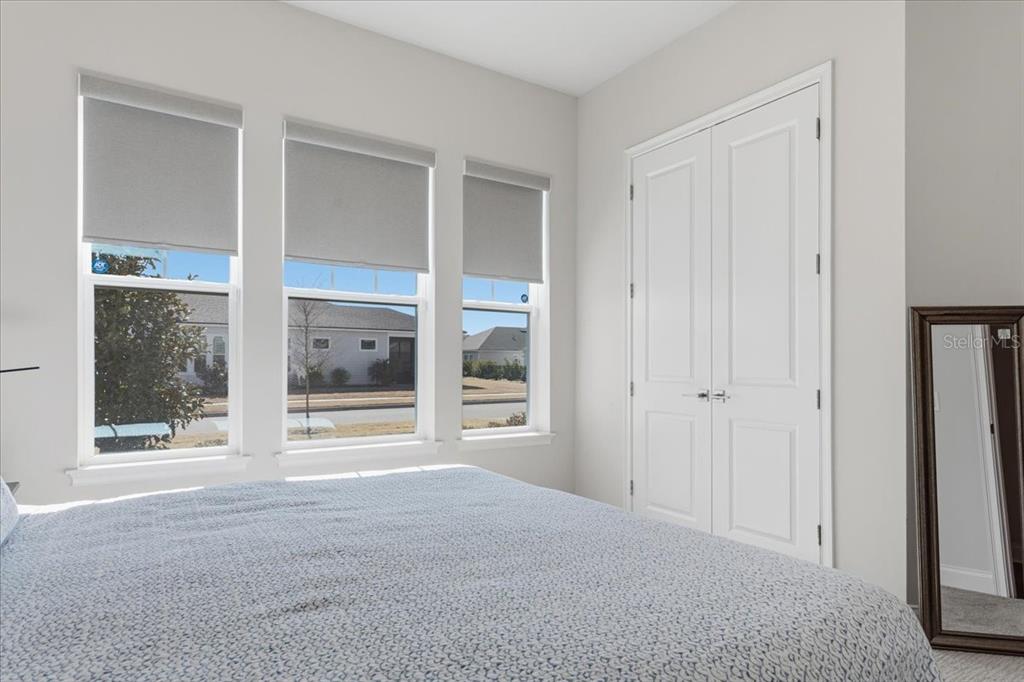 12030 Southwest 32nd Lane Gainesville, FL 32608 - Photo 30 of 57 a view of an empty room with a window