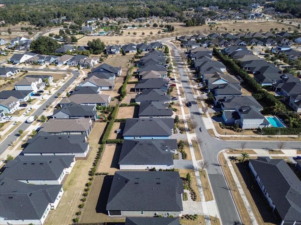 12030 Southwest 32nd Lane Gainesville, FL 32608 - Photo 44 of 57 an aerial view of residential houses with outdoor space