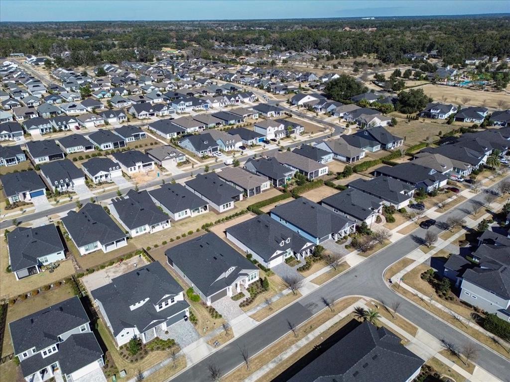 12030 Southwest 32nd Lane Gainesville, FL 32608 - Photo 46 of 57 an aerial view of a city with lots of residential buildings