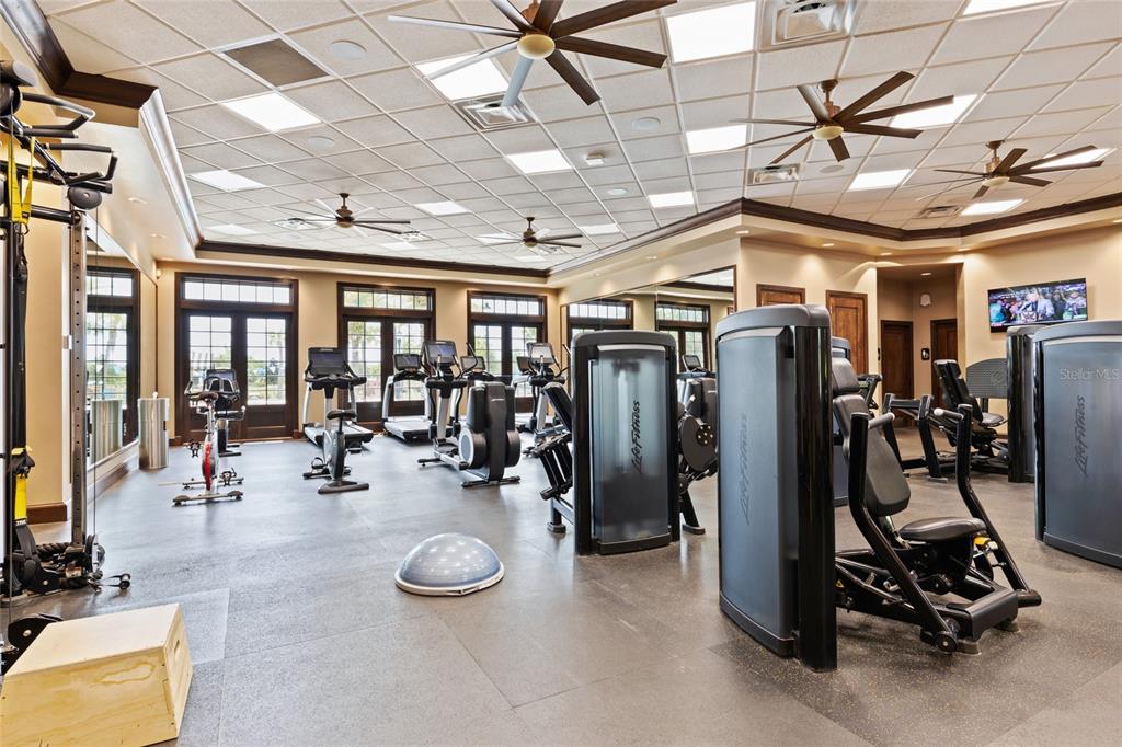 12030 Southwest 32nd Lane Gainesville, FL 32608 - Photo 56 of 57 a view of a room with gym equipment