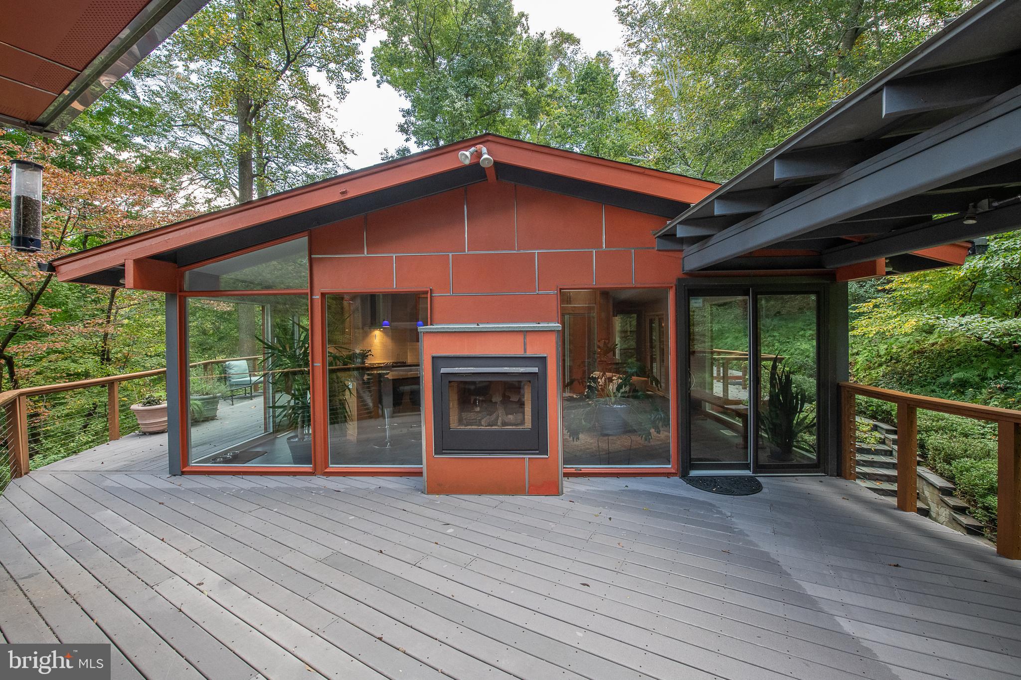 19 Paper Mill Road Newtown Square, PA 19073 - Photo 6 of 72 Trex deck, outdoor FP and transom to kitchen