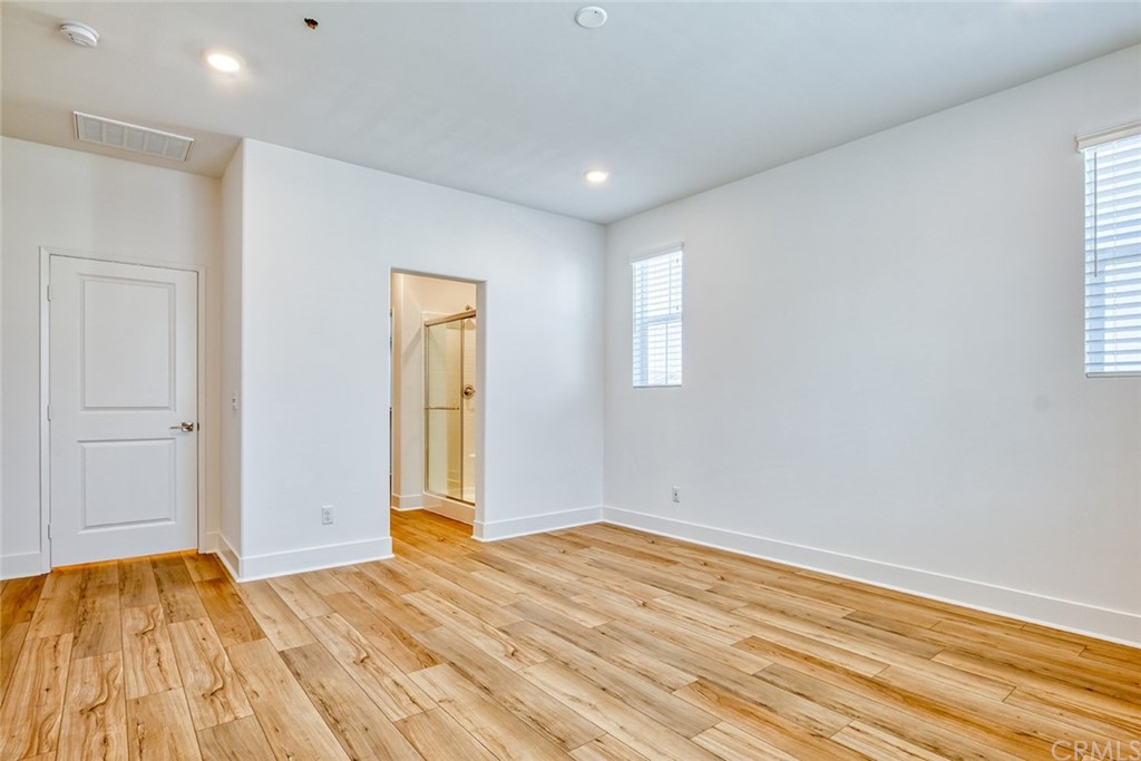 5603 Kate Way Fontana, CA 92336 - Photo 11 of 63 a view of empty room with wooden floor