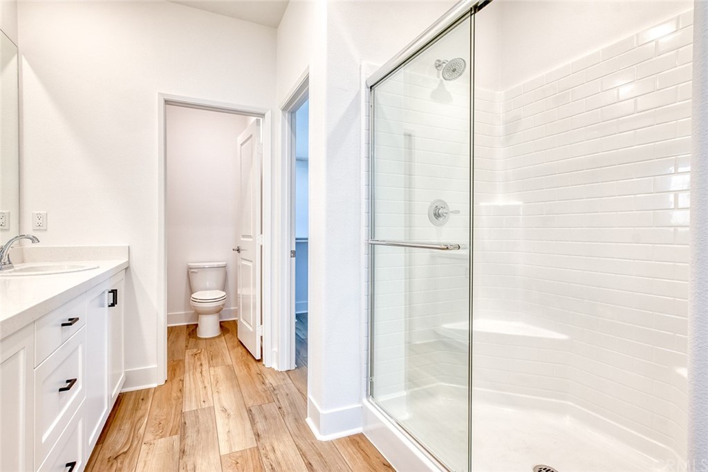 5603 Kate Way Fontana, CA 92336 - Photo 12 of 63 a spacious bathroom with a shower and a sink