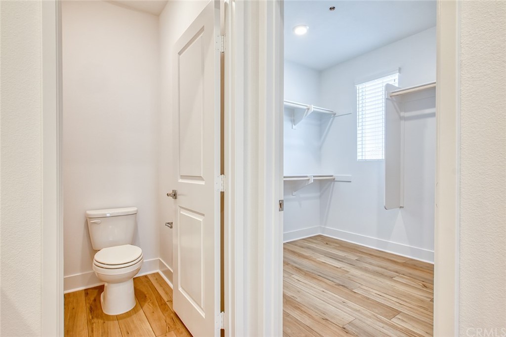 5603 Kate Way Fontana, CA 92336 - Photo 14 of 63 a bathroom with a toilet and a shower