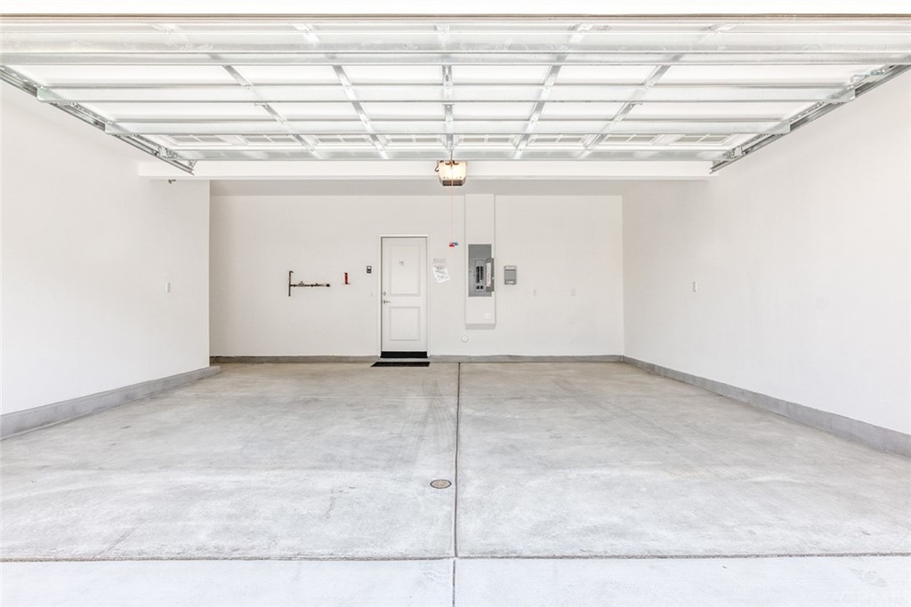 5603 Kate Way Fontana, CA 92336 - Photo 36 of 63 a view of a room with wooden floor