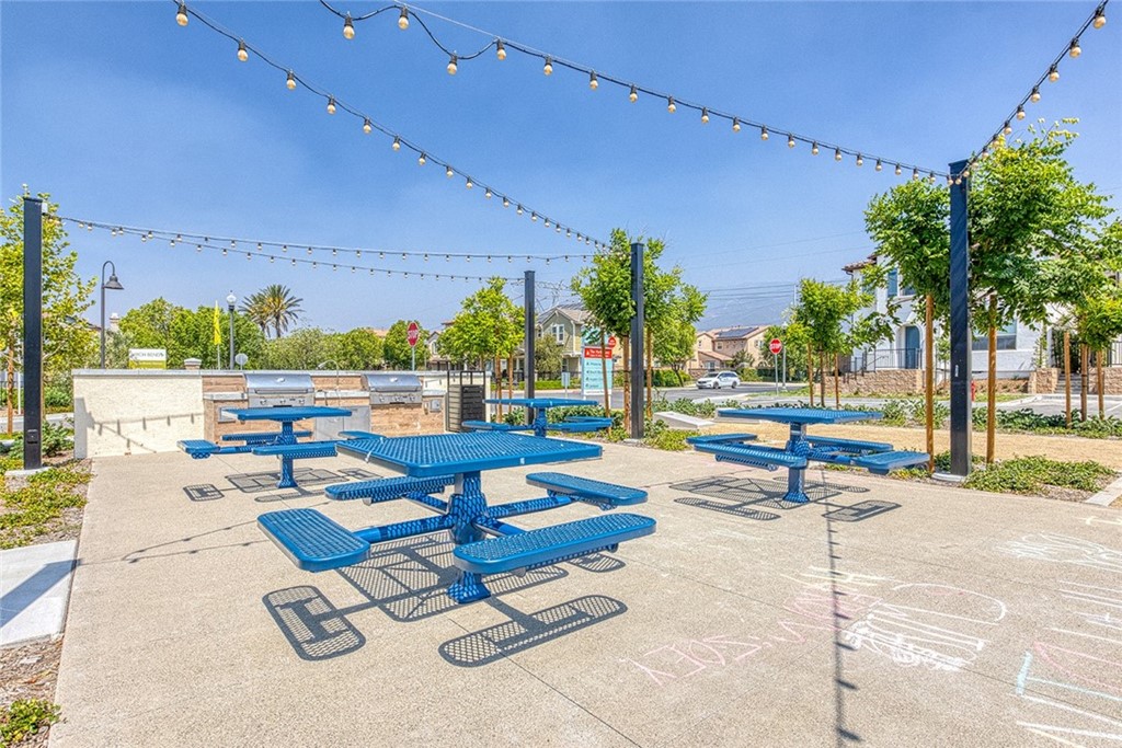 5603 Kate Way Fontana, CA 92336 - Photo 40 of 63 a swimming pool with outdoor seating and yard