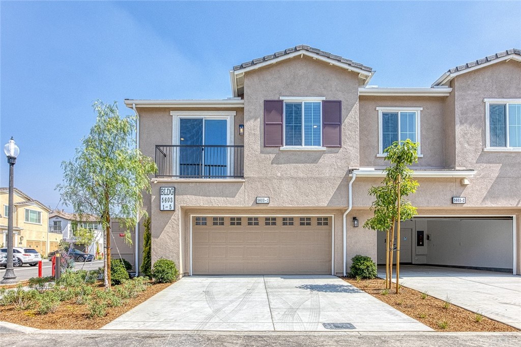 5603 Kate Way Fontana, CA 92336 - Photo 4 of 63 a front view of a house with a garden