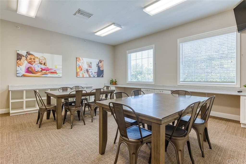 5603 Kate Way Fontana, CA 92336 - Photo 54 of 63 a view of a dining room with furniture and a large window