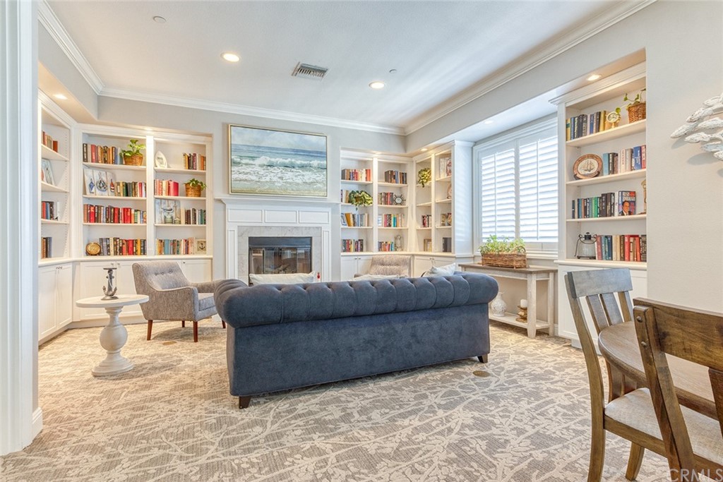 5603 Kate Way Fontana, CA 92336 - Photo 56 of 63 a living room with furniture and a fireplace