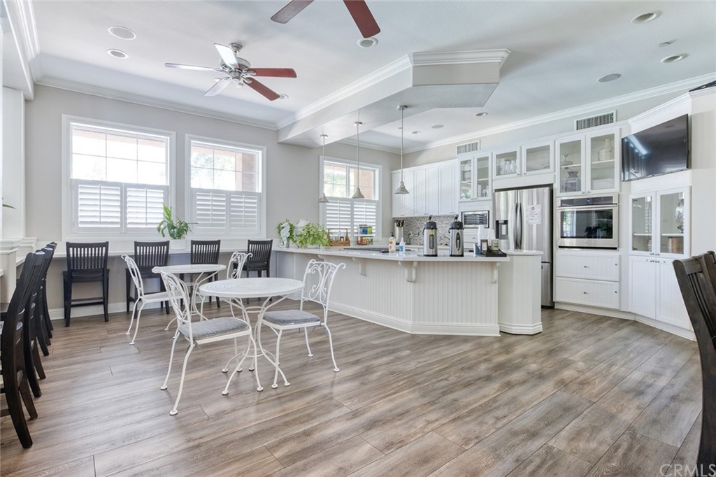 5603 Kate Way Fontana, CA 92336 - Photo 59 of 63 a dining hall with stainless steel appliances granite countertop a stove and a refrigerator