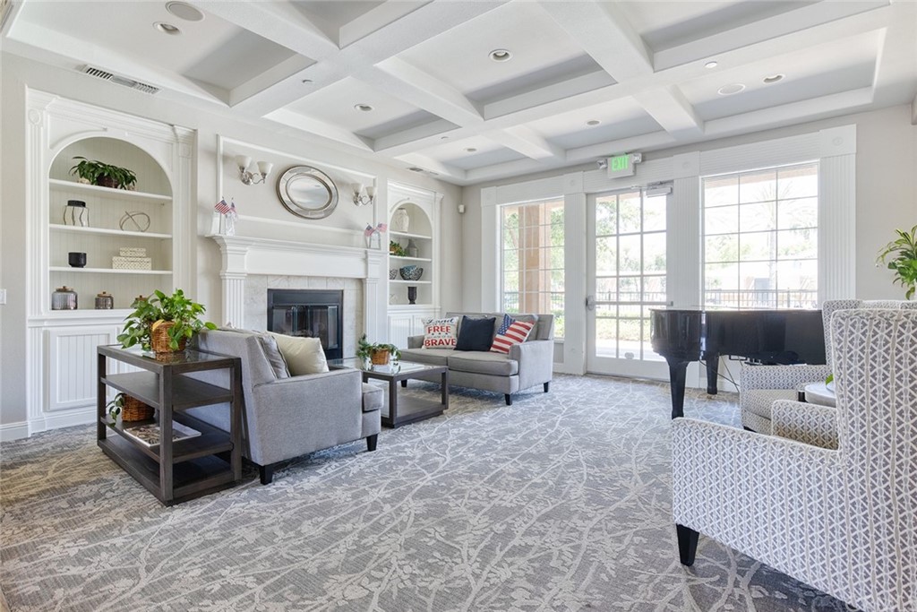 5603 Kate Way Fontana, CA 92336 - Photo 60 of 63 a living room with furniture and a fireplace