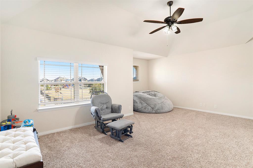 1076 Imperial Eagle Road Alvarado, TX 76009 - Photo 19 of 32 a living room with furniture and a window