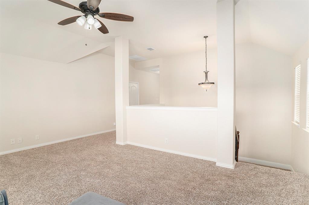 1076 Imperial Eagle Road Alvarado, TX 76009 - Photo 20 of 32 a view of a room with a ceiling fan and closet