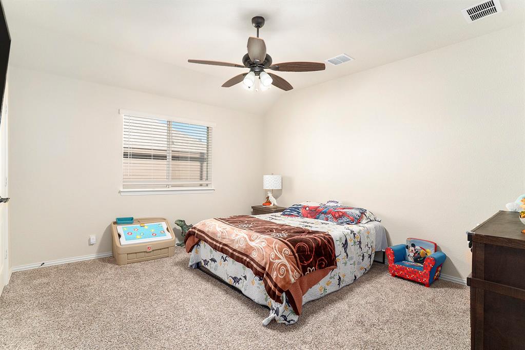 1076 Imperial Eagle Road Alvarado, TX 76009 - Photo 26 of 32 a bedroom with a bed and window