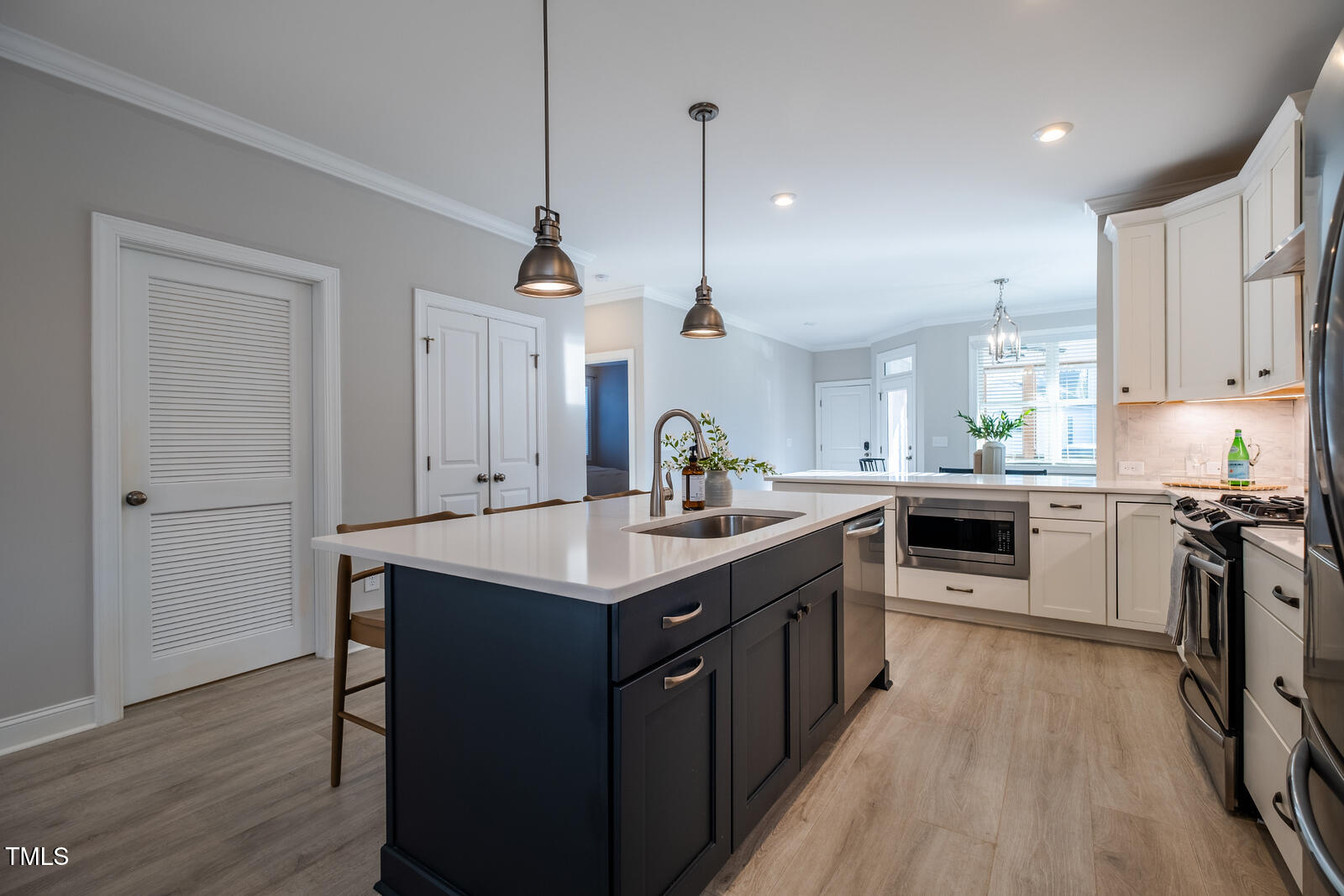 167 Logbridge Road Chapel Hill, NC 27516 - Photo 15 of 45 Laundry and pantry doors are seen here.