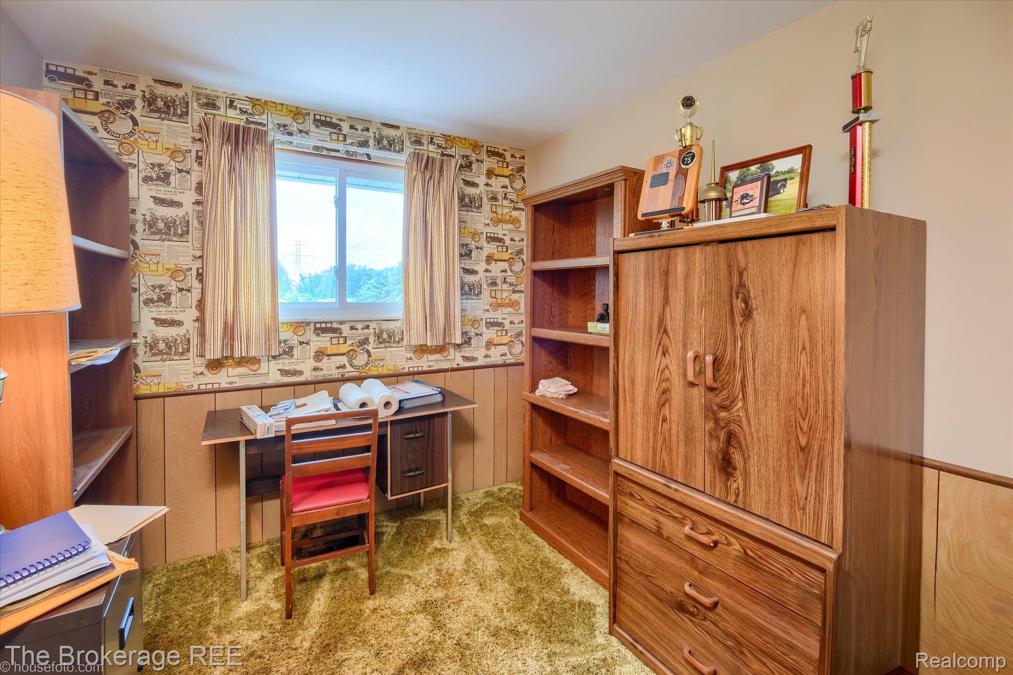 6129 East Lake Road Millington, MI 48746 - Photo 25 of 47 Office space featuring a wainscoted wall, light carpet, wallpapered walls, and wooden walls