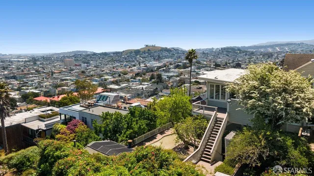 a view of a balcony with an outdoor space