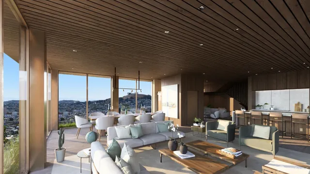 a living room with furniture and a floor to ceiling window