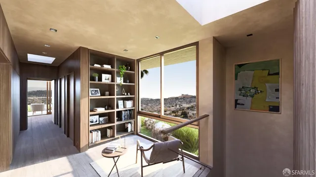 a front view of a residential apartment building with a yard