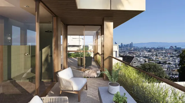 a front view of a house with a yard and balcony