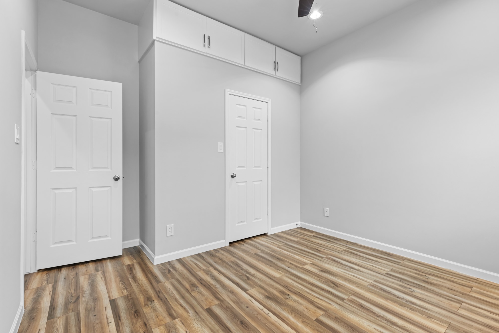 1505 Hussion Street Houston, TX 77003 - Photo 28 of 34 a view of empty room with wooden floor and fan