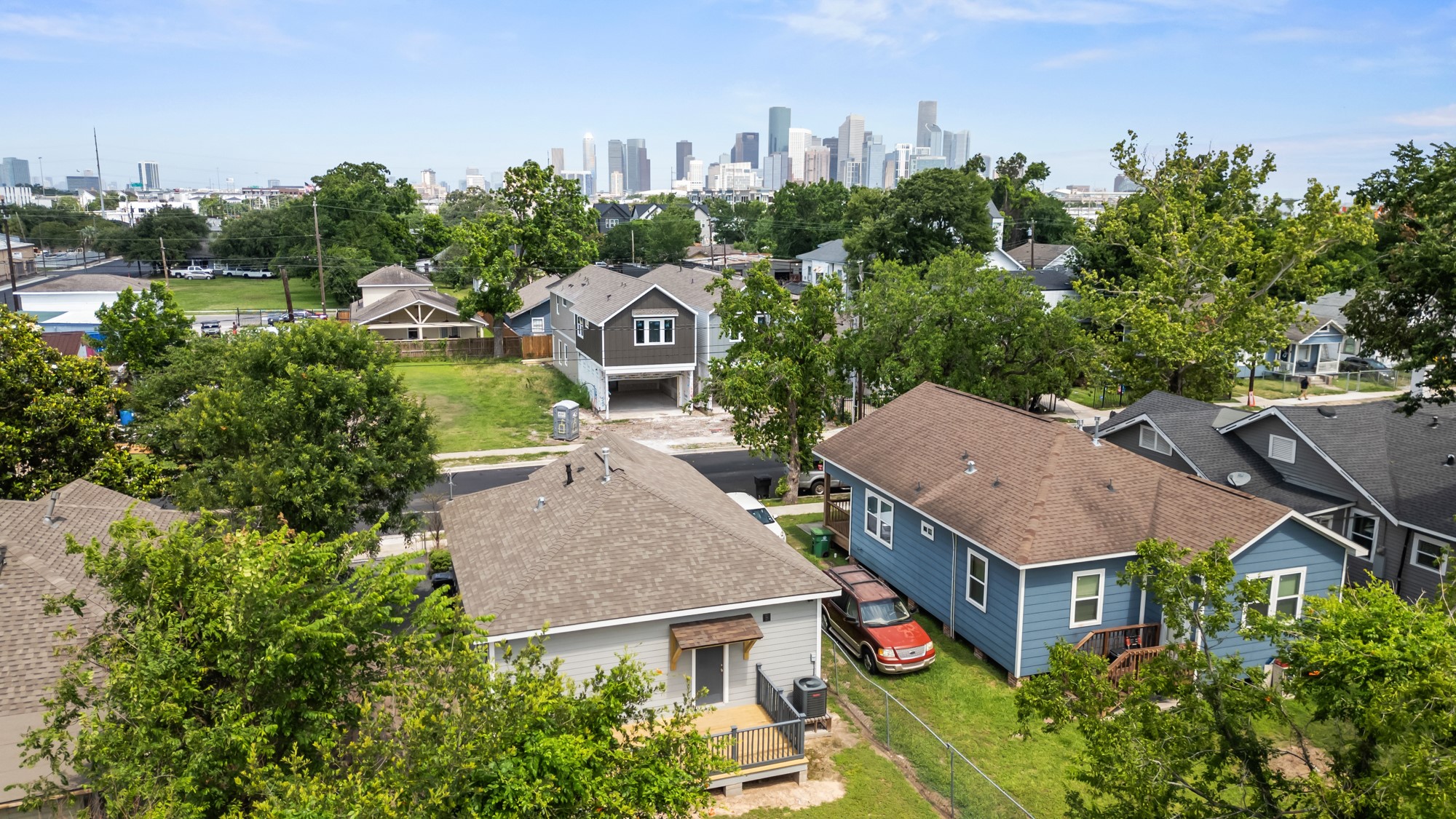 1505 Hussion Street Houston, TX 77003 - Photo 5 of 34 an aerial view of multiple houses with a yard