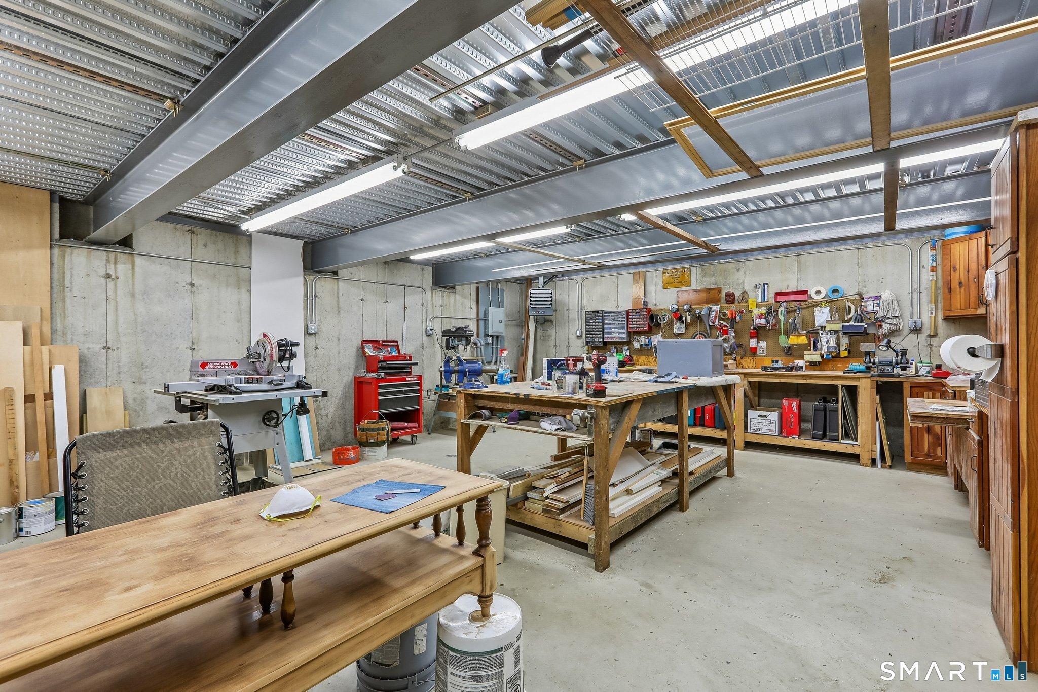 17 Ridge Road Danbury, CT 06810 - Photo 20 of 35 Basement of garage - set up as workshop