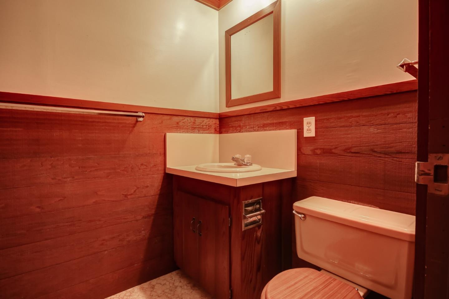 410 Bardin Road Salinas, CA 93905 - Photo 20 of 40 a bathroom with a sink a toilet and mirror