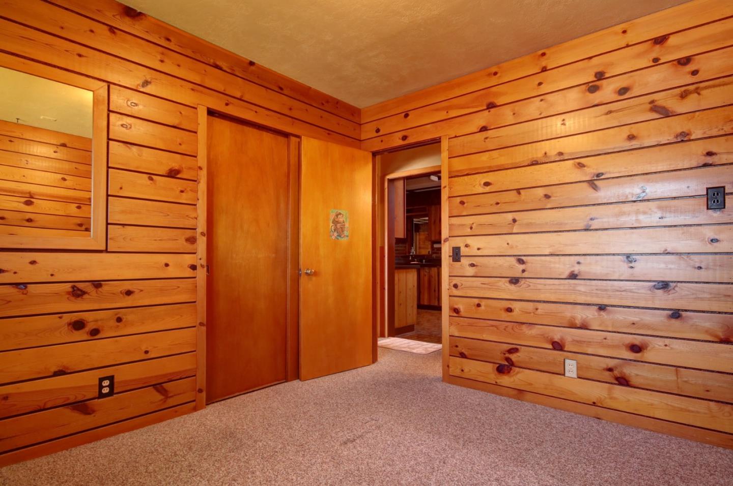 410 Bardin Road Salinas, CA 93905 - Photo 24 of 40 a view of a wooden wall and an entryway