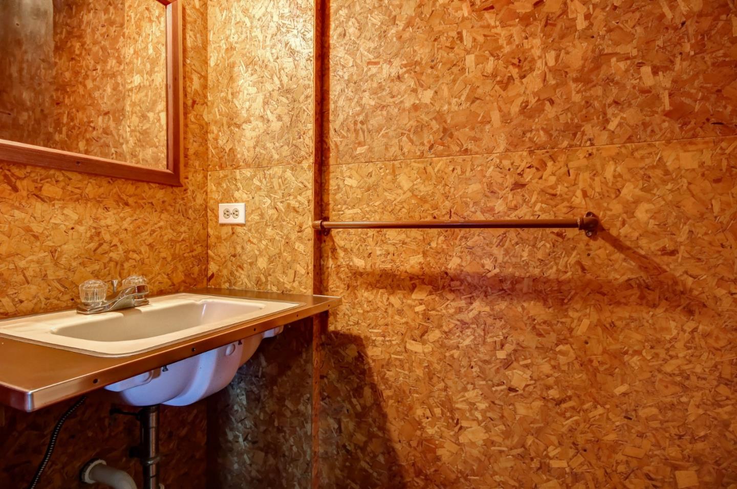 410 Bardin Road Salinas, CA 93905 - Photo 27 of 40 a bathroom with a sink and a mirror