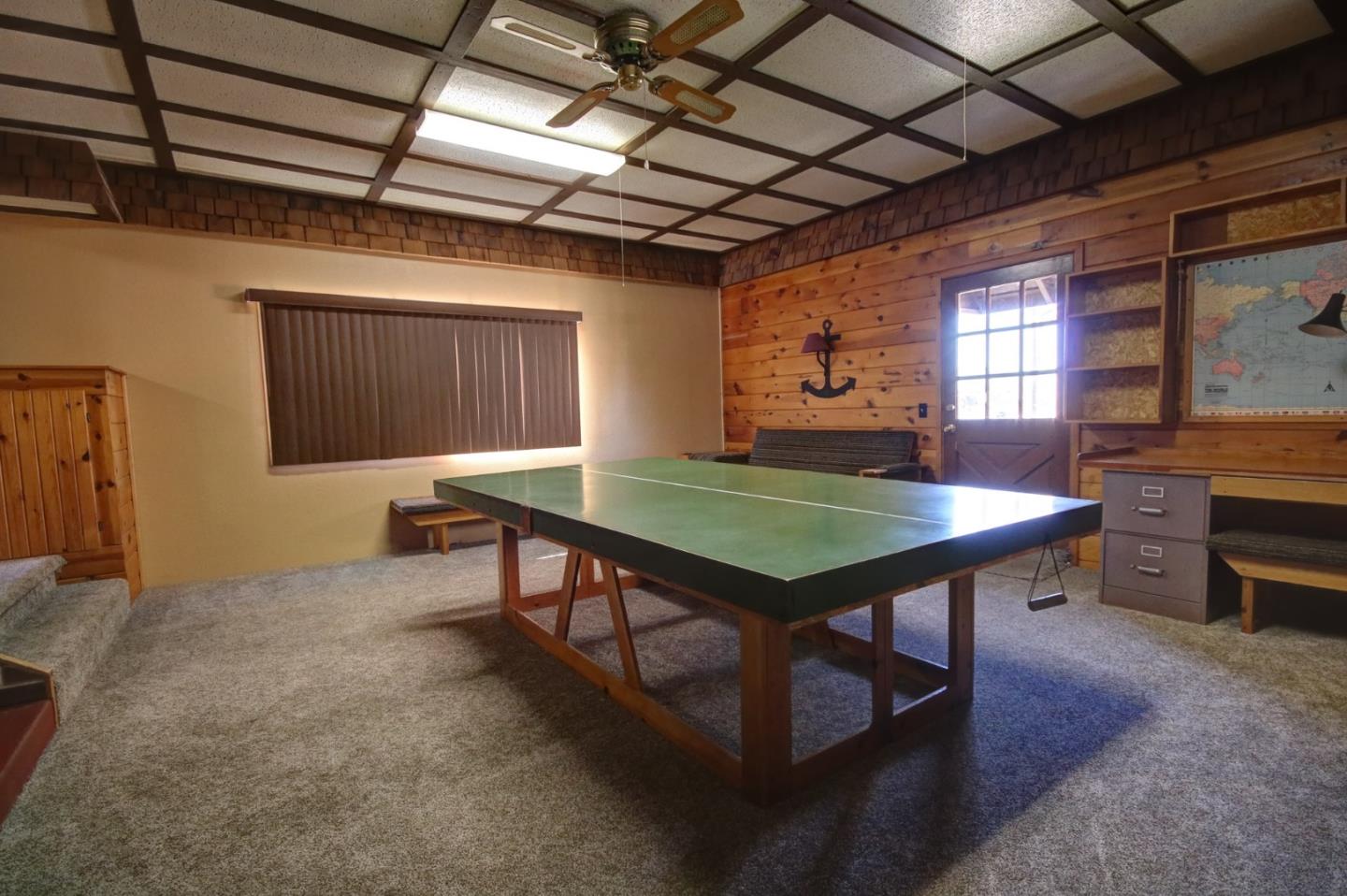 410 Bardin Road Salinas, CA 93905 - Photo 29 of 40 a room with furniture and a wooden floor