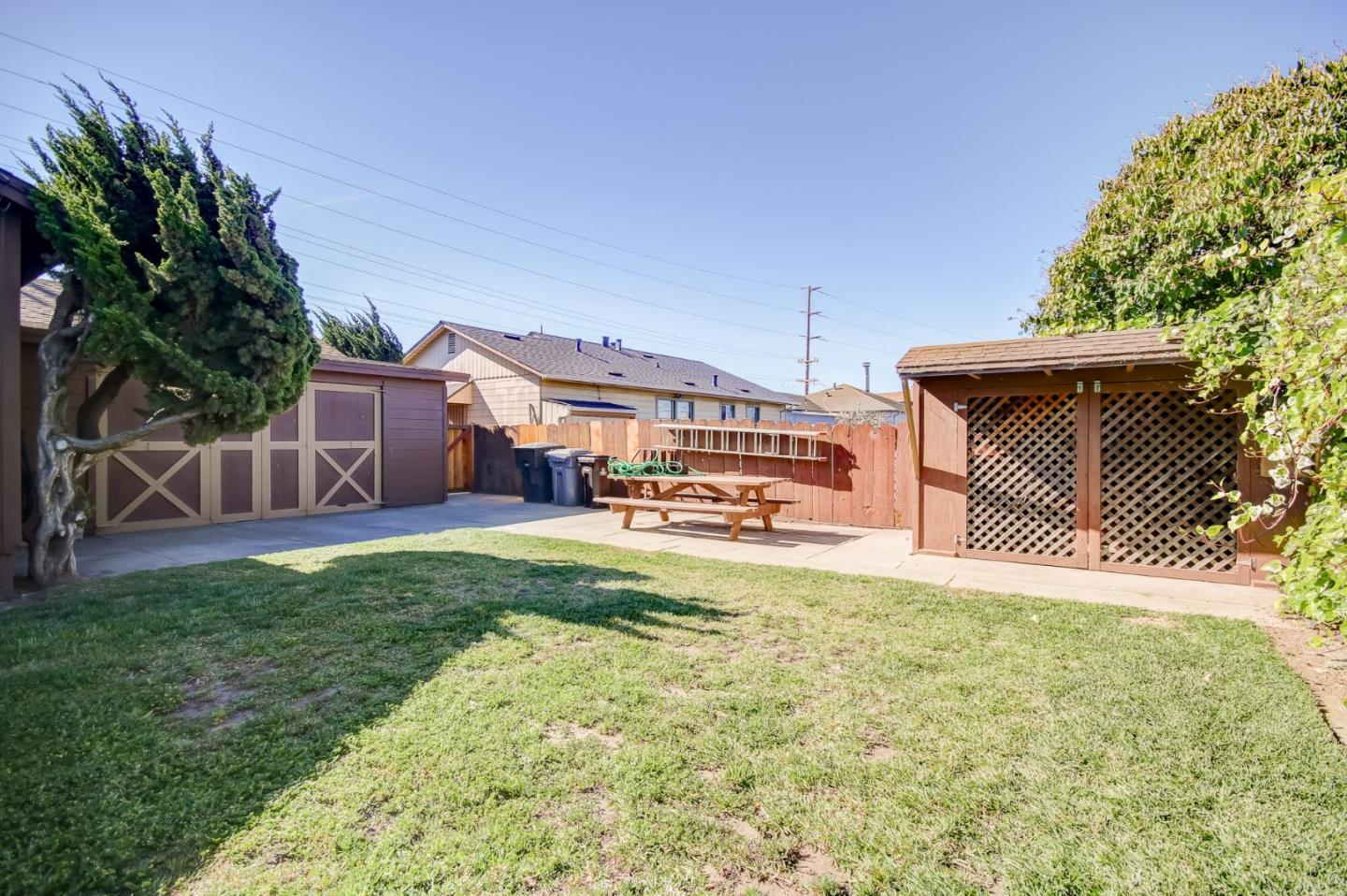 410 Bardin Road Salinas, CA 93905 - Photo 3 of 40 a view of a house with a yard and a car park in front of it