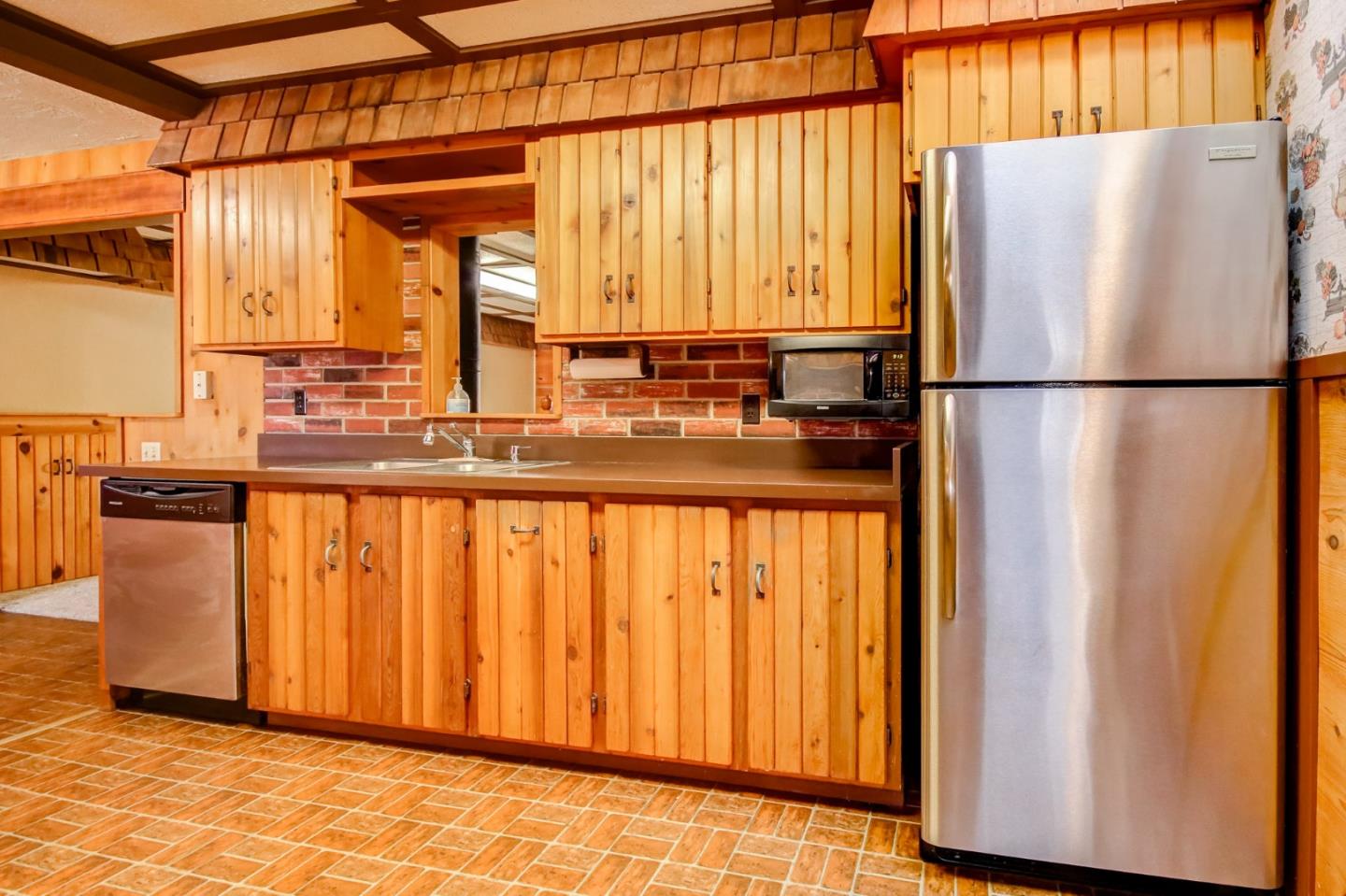 410 Bardin Road Salinas, CA 93905 - Photo 33 of 40 a kitchen with stainless steel appliances a refrigerator and a window