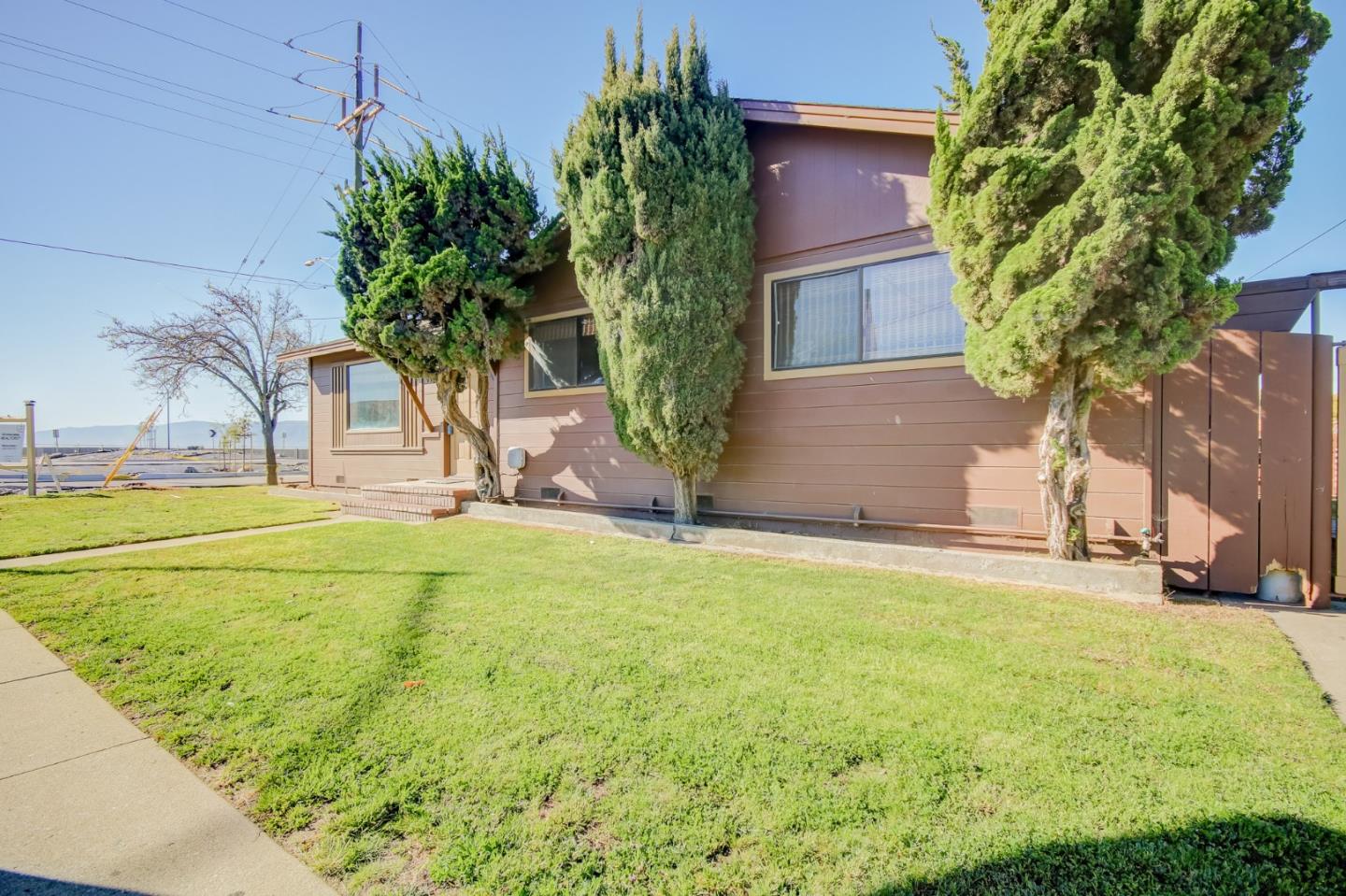 410 Bardin Road Salinas, CA 93905 - Photo 39 of 40 a view of an house with backyard and trees