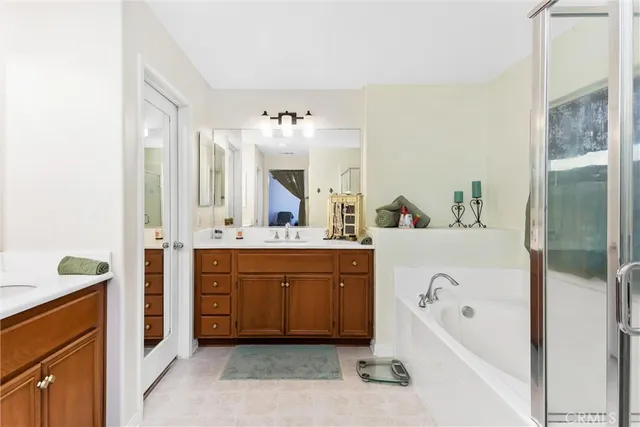 a view of a city with lush green forest