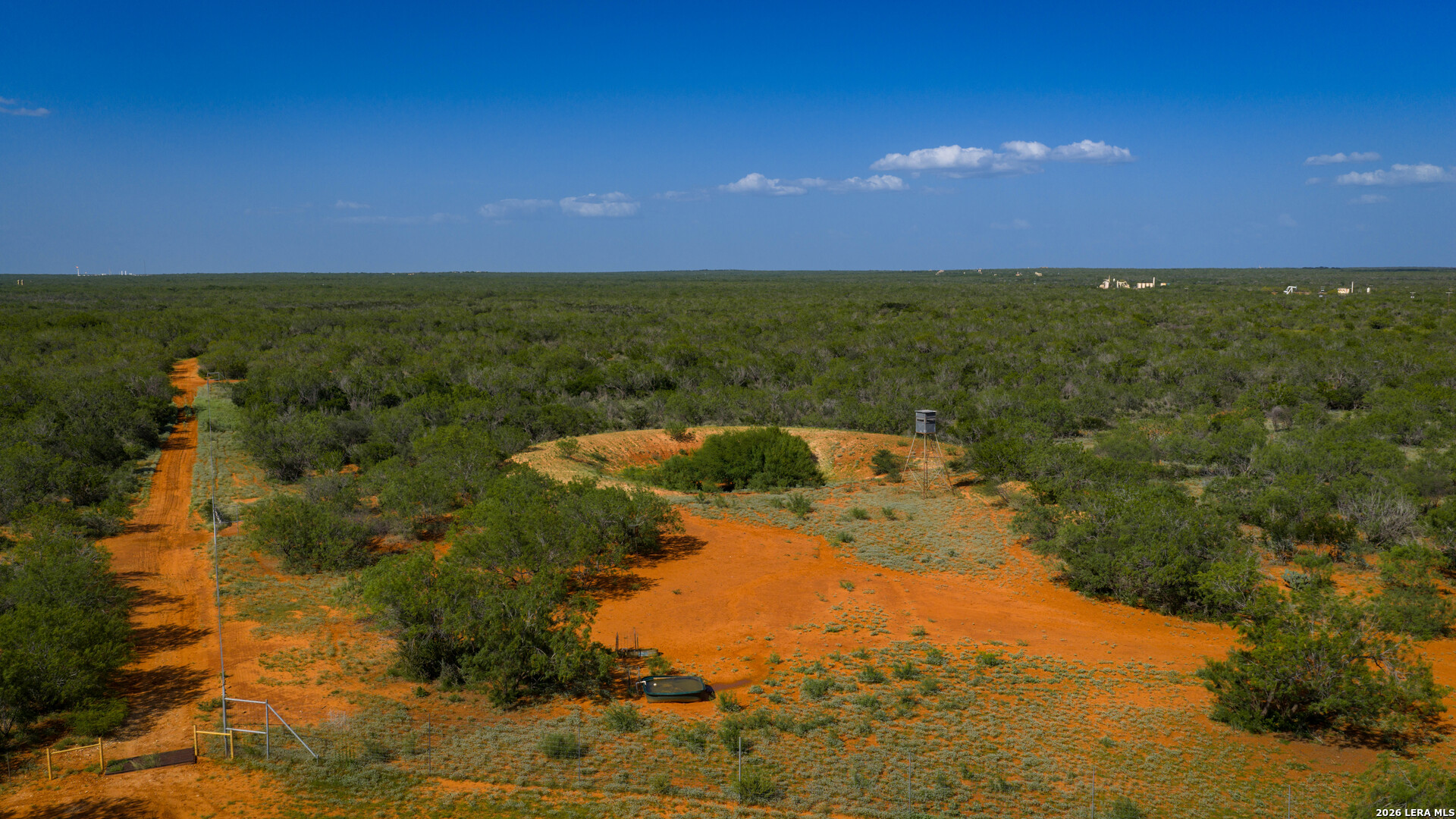 0 Vesper Cotulla, TX 78014 - Photo 21 of 30 a view of a lake with a house
