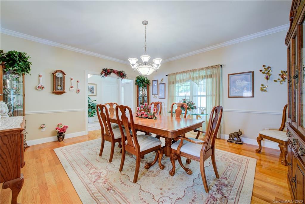 146 Pumkin Patch Road Rutherfordton, NC 28139 - Photo 19 of 48 a view of a dining room with furniture and chandelier